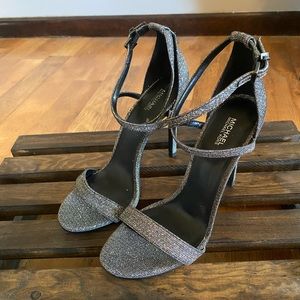 Michael Kors Silver glitter heels in great condition! Size 8 1/2.